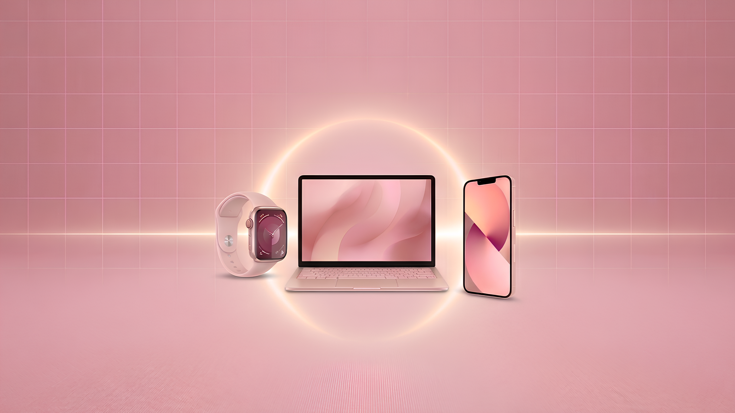 Um conjunto tecnológico composto por um MacBook, um iPhone e um Apple Watch em tons de rosa e ouro rosa, centralizado sob um halo de luz em um cenário minimalista.
